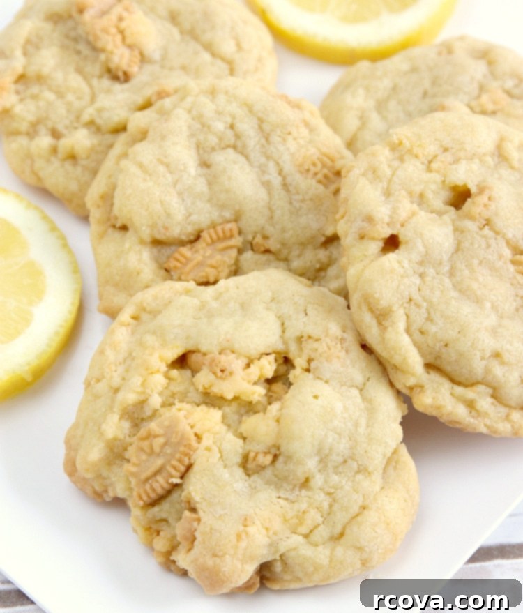 Zesty Lemon Burst Cookies 2 Double Lemon Cookies made with lemon pudding mix and crushed Lemon Oreos for lots of delicious lemon flavor! These cookies are soft, chewy and super easy to make too!