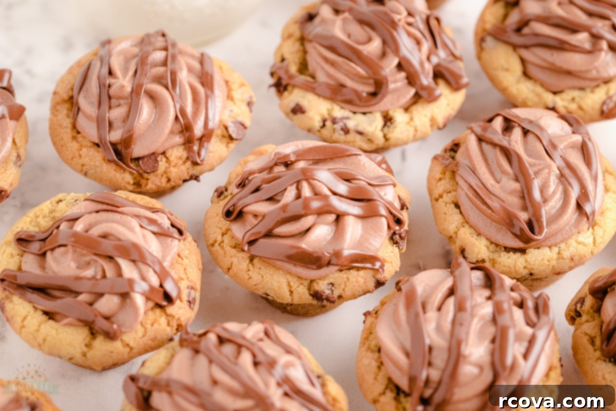 Nutella Cloud Cookies 3 A top-down shot of a Nutella Mousse Cookie Cup with a generous swirl of Nutella mousse and chocolate chips, ready to be enjoyed.