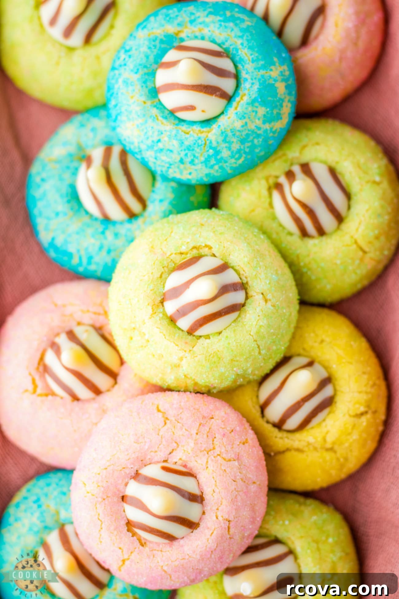 Dawn Blossom Delights 3 Close-up of pastel colored Easter Blossom cookies with chocolate kisses