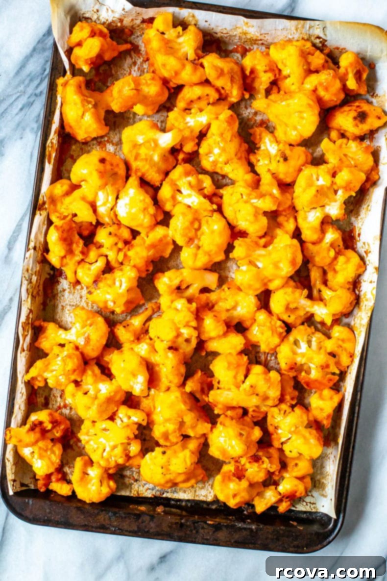Spicy Baked Buffalo Cauliflower Wings 10 Platter of Baked Buffalo Cauliflower with various dipping sauces and fresh vegetables