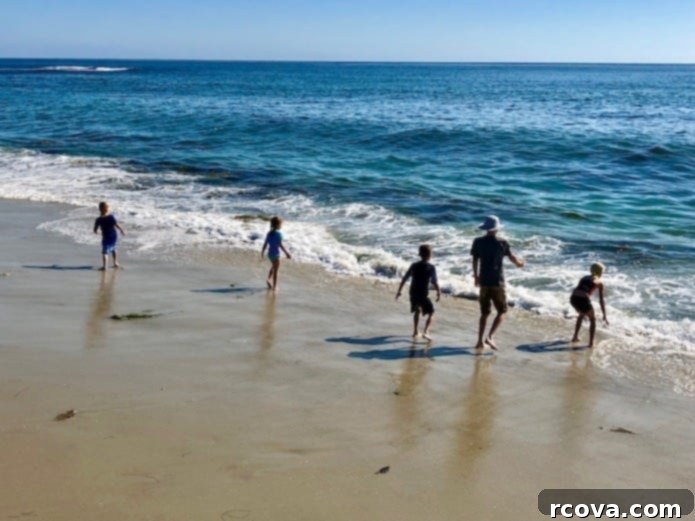 Irresistible Butter Pecan Chocolate Chip Cookies 13 Five kids playing in ocean waves, a moment of family fun.