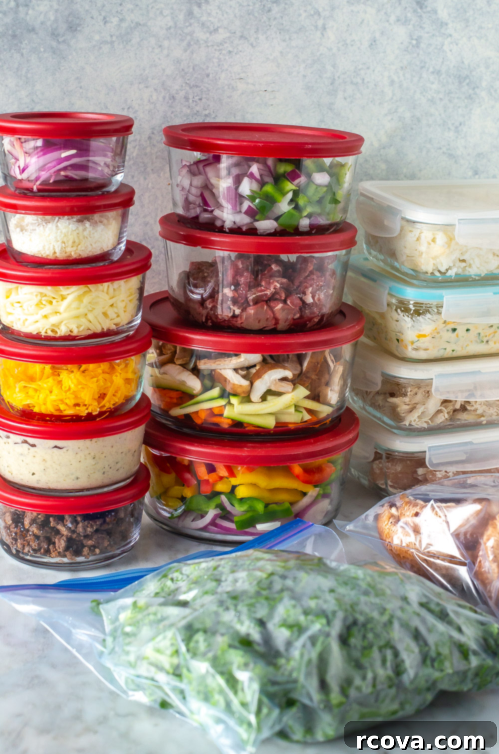 The Ultimate Guide to Meal Prep Containers 5 Overhead shot of round glass container with colorful ingredients, such as chopped vegetables and dressing, ready for meal prep.