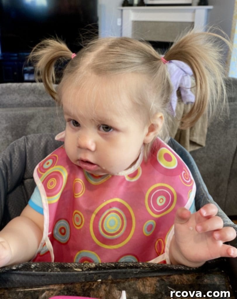 Mini Raspberry Cheesecake Cookie Cups 13 A heartwarming photo of Baby B with her first pigtails, a personal family milestone shared by the author.