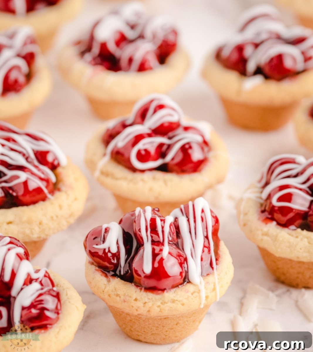 Golden Cherry Pie Bites 3 Close-up of Cherry Pie Cookies showing the vibrant cherry filling in sugar cookie cups.