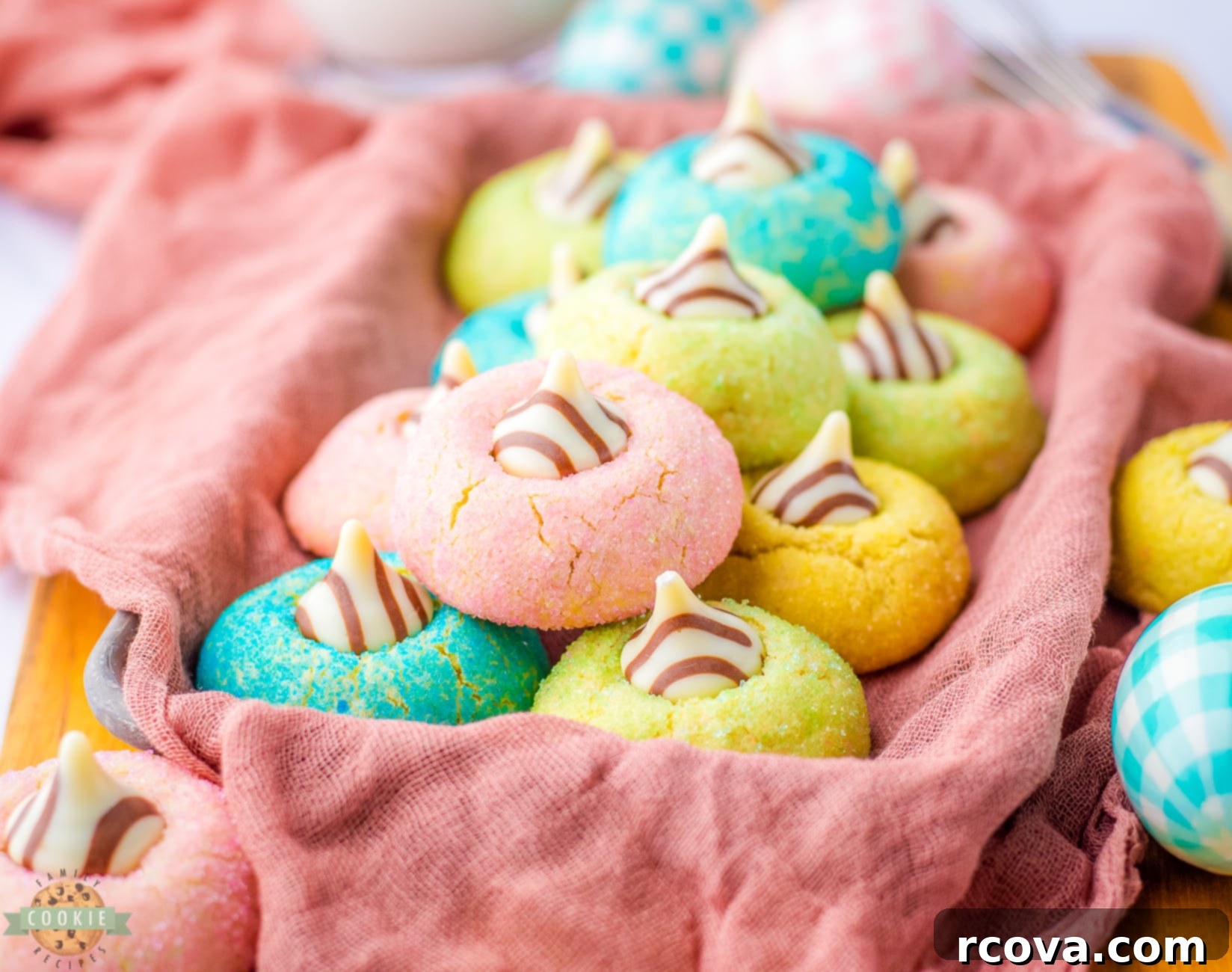 Spring Cookie Delights 3 Festive Easter Blossom cookies topped with colorful Hersheys Hugs and pastel sprinkles.