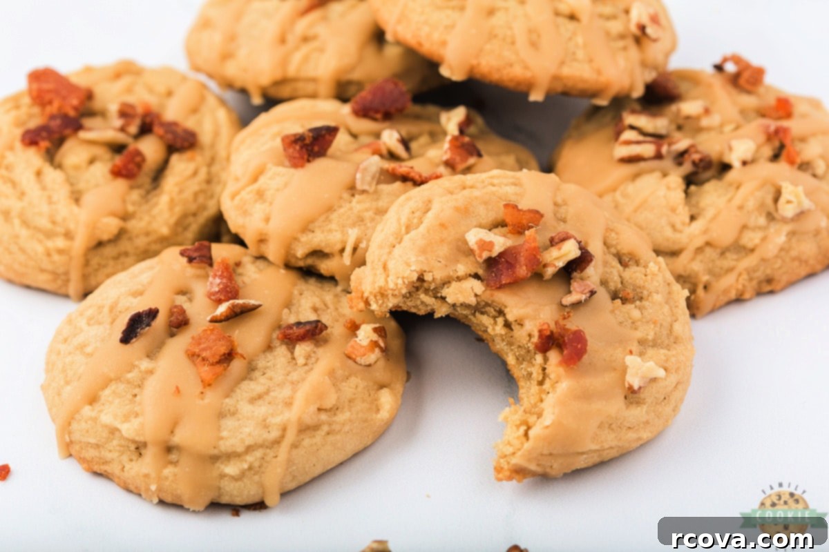 Sweet & Savory Maple Bacon Cookies 15 A close-up shot of Maple Bacon Cookies arranged artfully, showcasing their texture and the appealing contrast of maple icing and bacon bits.
