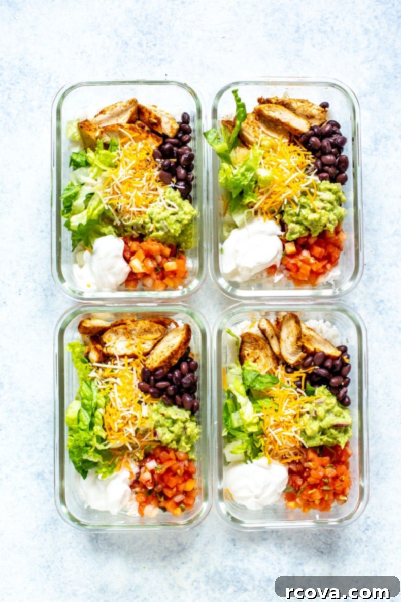 Homemade Taco Bell Power Bowl Recipe 2 A vibrant, fresh Taco Bell Power Bowl with seasoned chicken, rice, black beans, guacamole, pico de gallo, lettuce, cheese, and sour cream, perfect for a healthy meal prep.