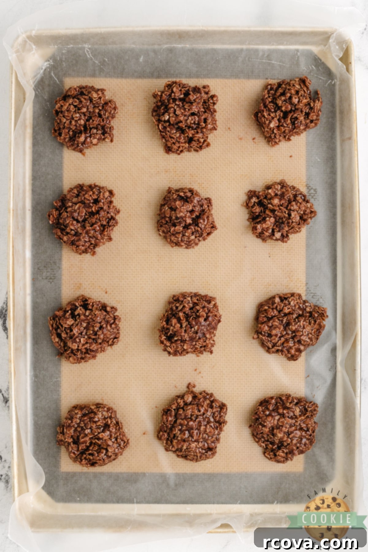 Instant Microwave Cookies 9 No-bake cookies scooped and dropped on wax paper.