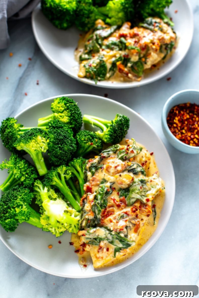 Effortless Creamy Basil Chicken Skillet 9 Creamy Basil Chicken Skillet on a dining table ready to be served, highlighting its appealing presentation.