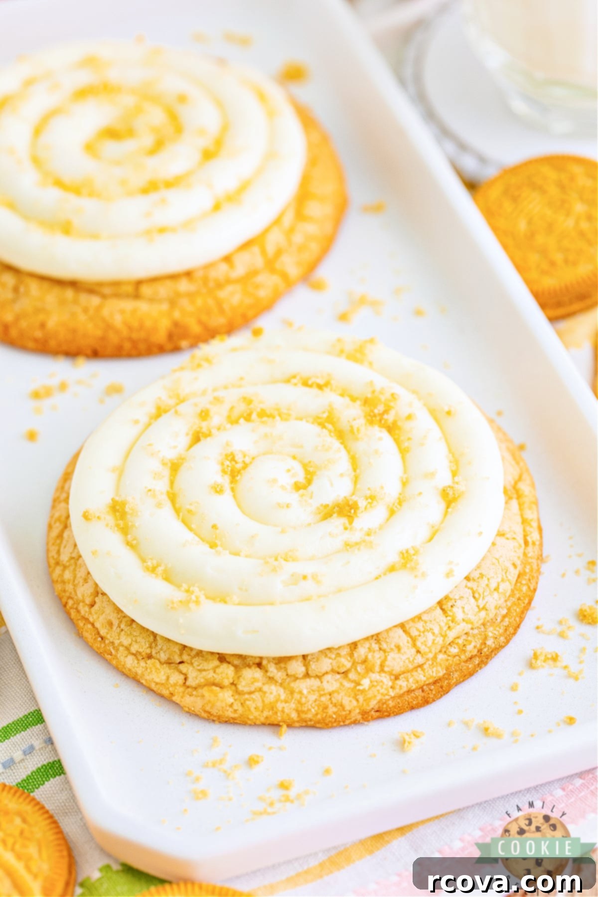 Crumbl-Inspired Golden Oreo Cookies 13 A perfectly baked and frosted vanilla cookie with cream cheese frosting and Golden Oreo crumbs, ready to be enjoyed.