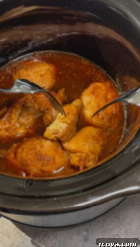 Simply Wholesome Slow Cooker Sesame Chicken 4 Shredded tender sesame chicken in slow cooker after cooking