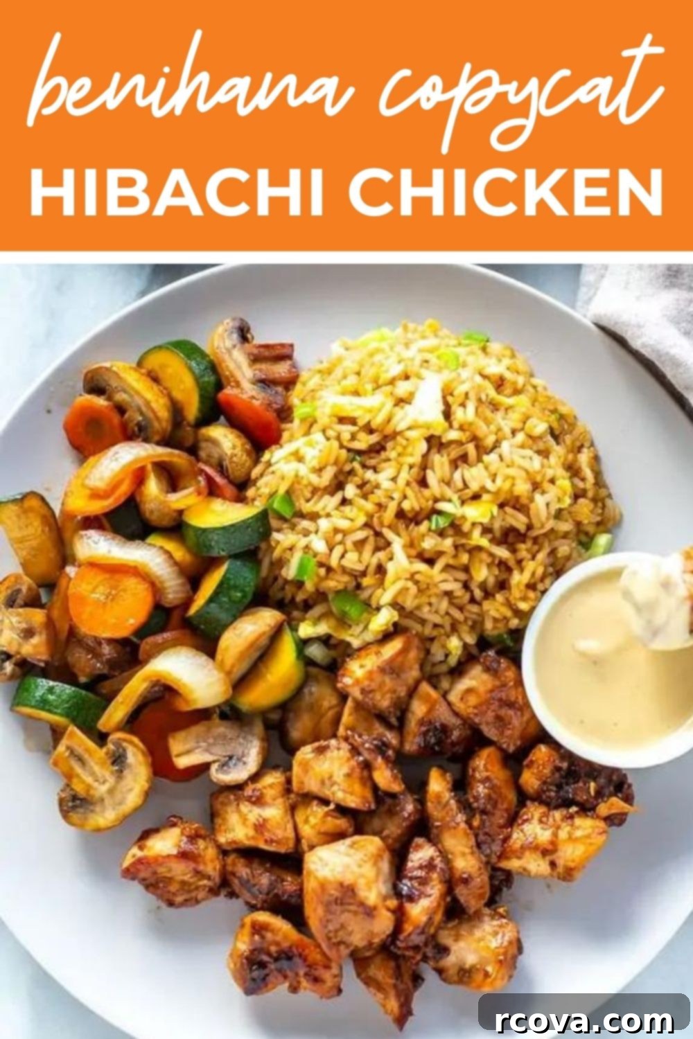Ultimate Hibachi Chicken 12 Plate of hibachi chicken, sauteed veggies, fried rice and mustard sauce, with text that says 'Benihana Copycat Hibachi Chicken'