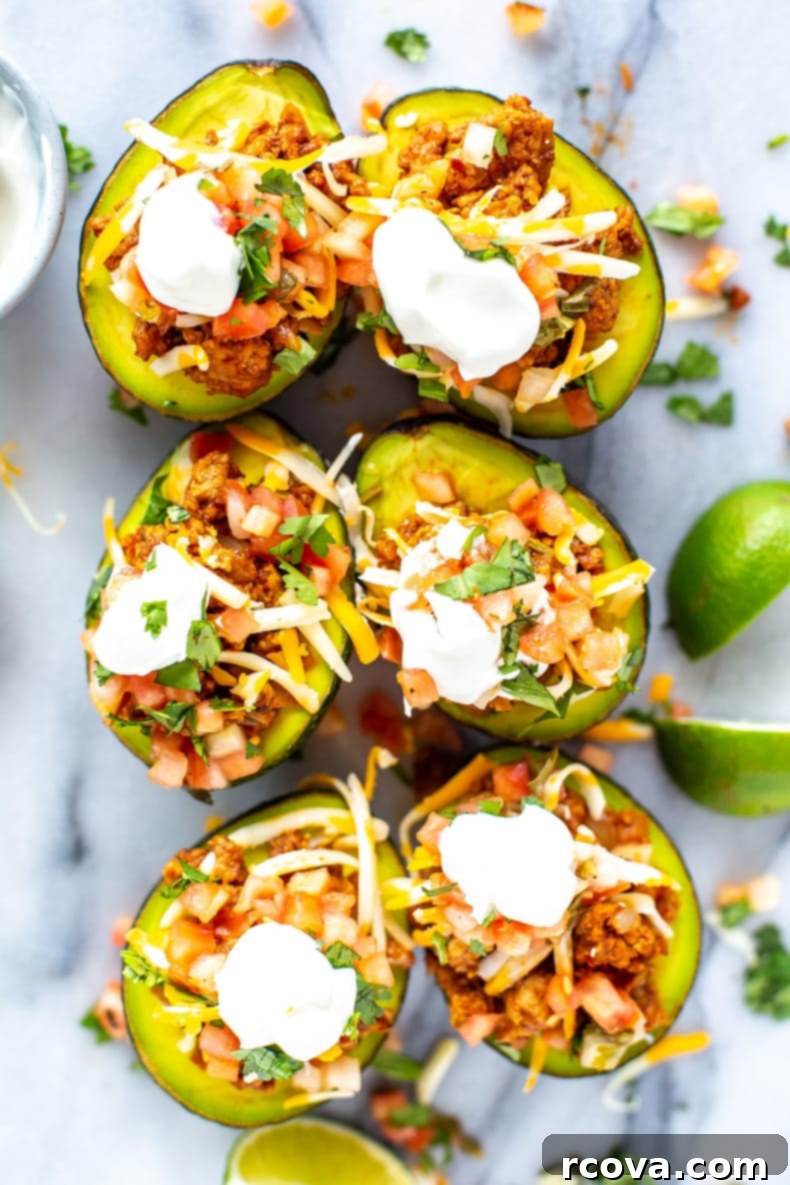 Avocado Taco Boats 10 A vibrant, close-up shot of Low Carb Taco Stuffed Avocados.