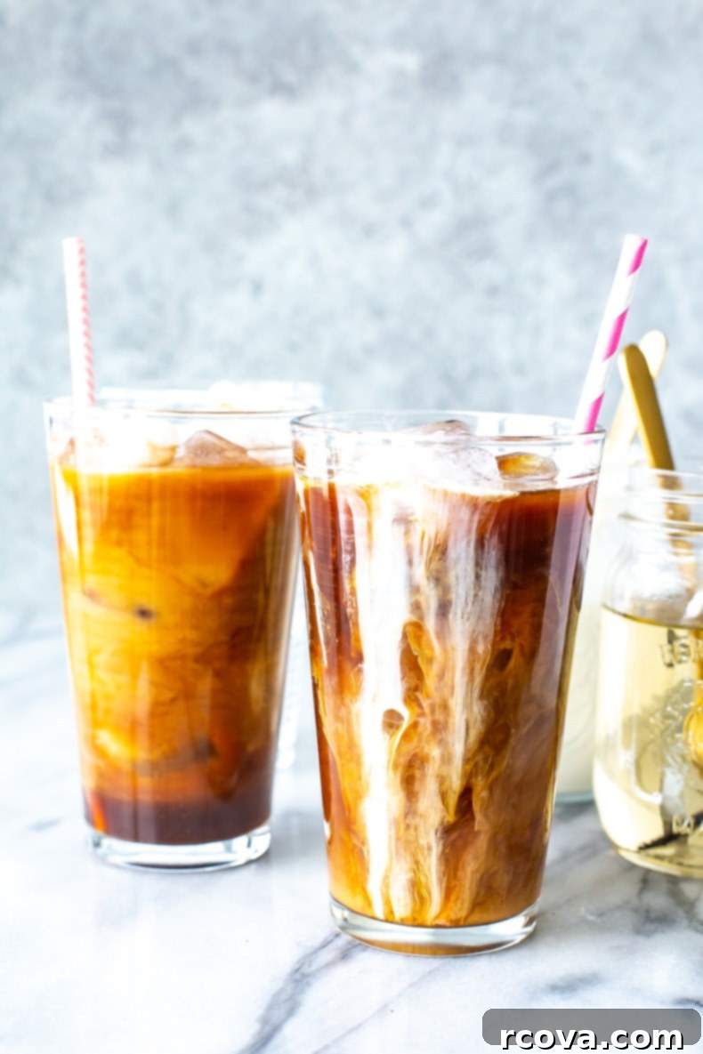 Starbucks Copycat Vanilla Sweet Cream Cold Brew 10 Vanilla Sweet Cream Cold Brew with a plant in the background