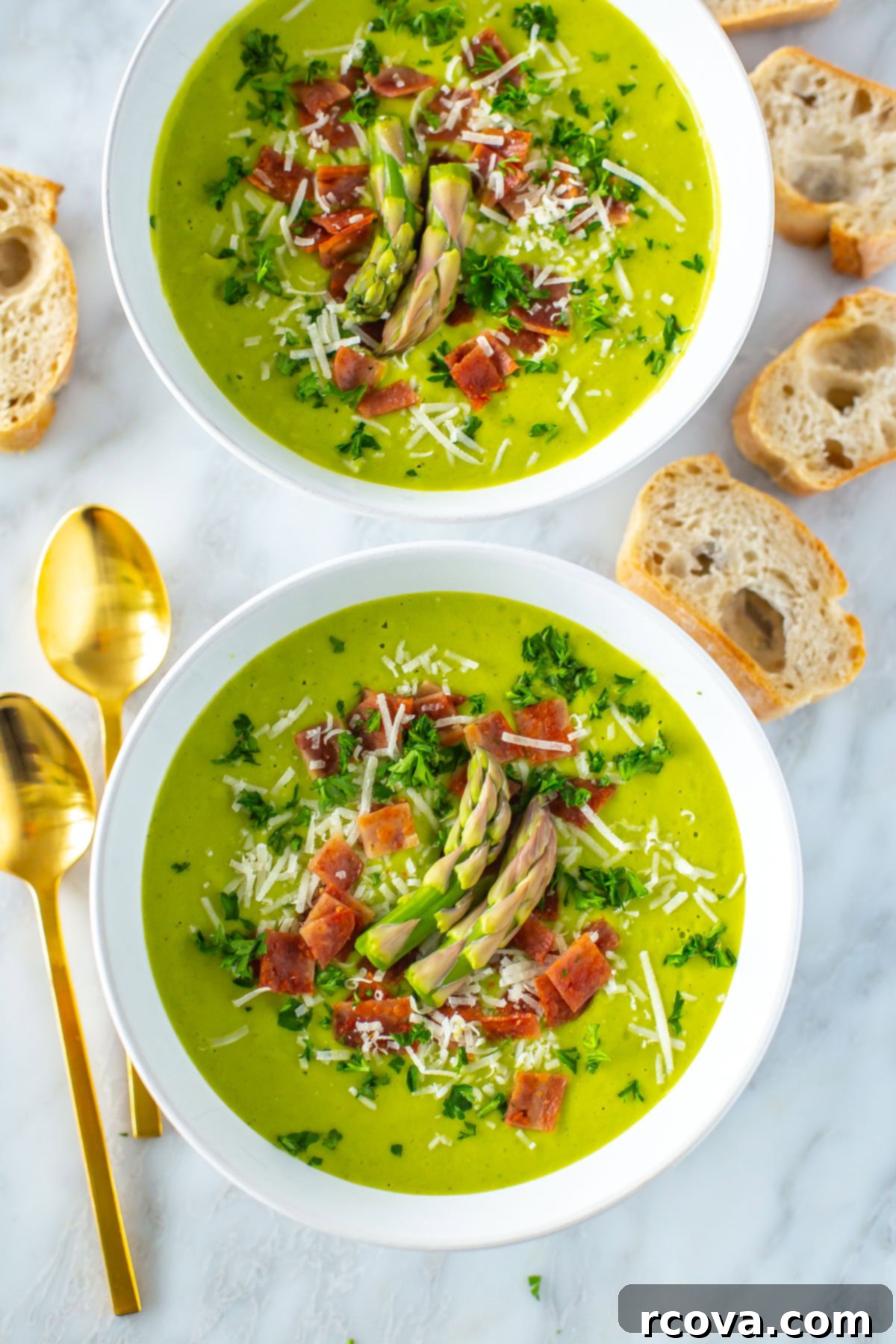 Simple Creamy Asparagus Soup 2 Two bowls of luscious Cream of Asparagus soup, garnished and ready to serve.