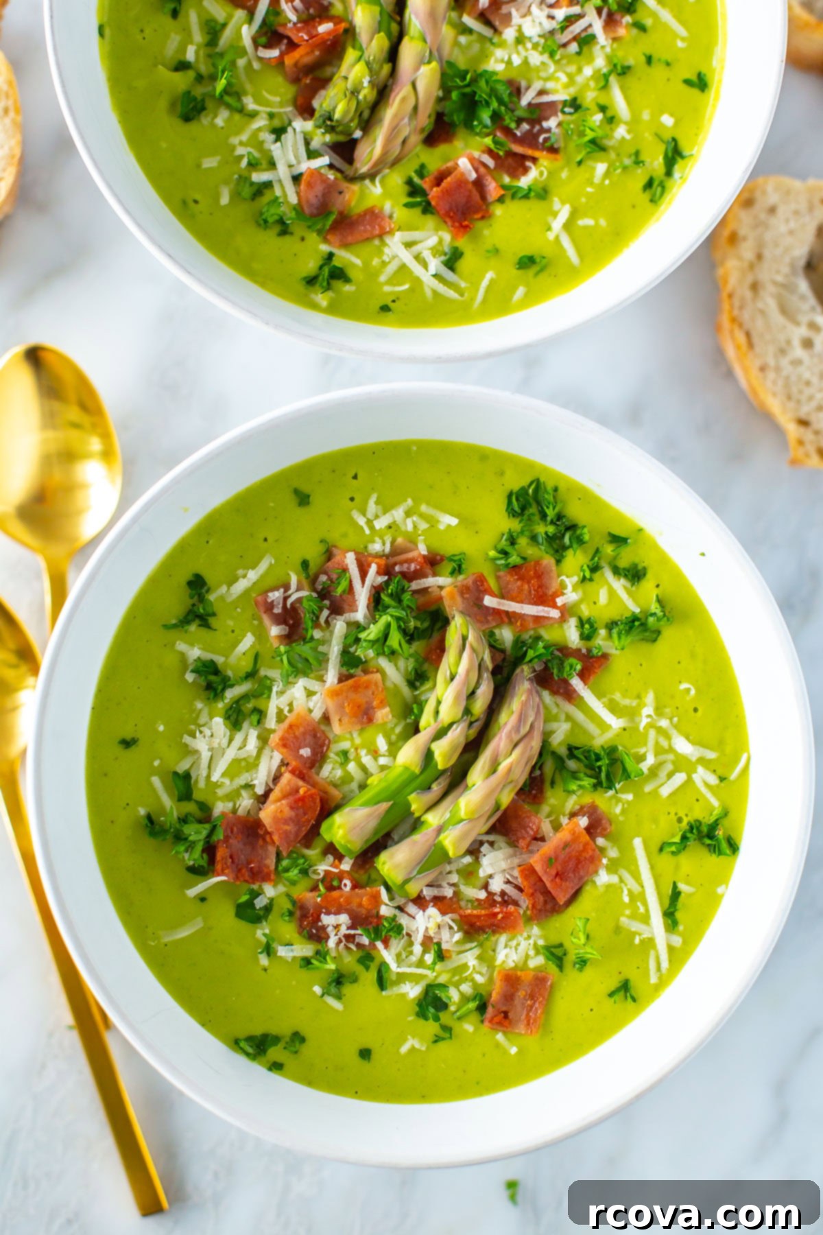 Simple Creamy Asparagus Soup 10 Another close-up of a bowl of Cream of Asparagus soup, showcasing its delightful texture and fresh garnishes.