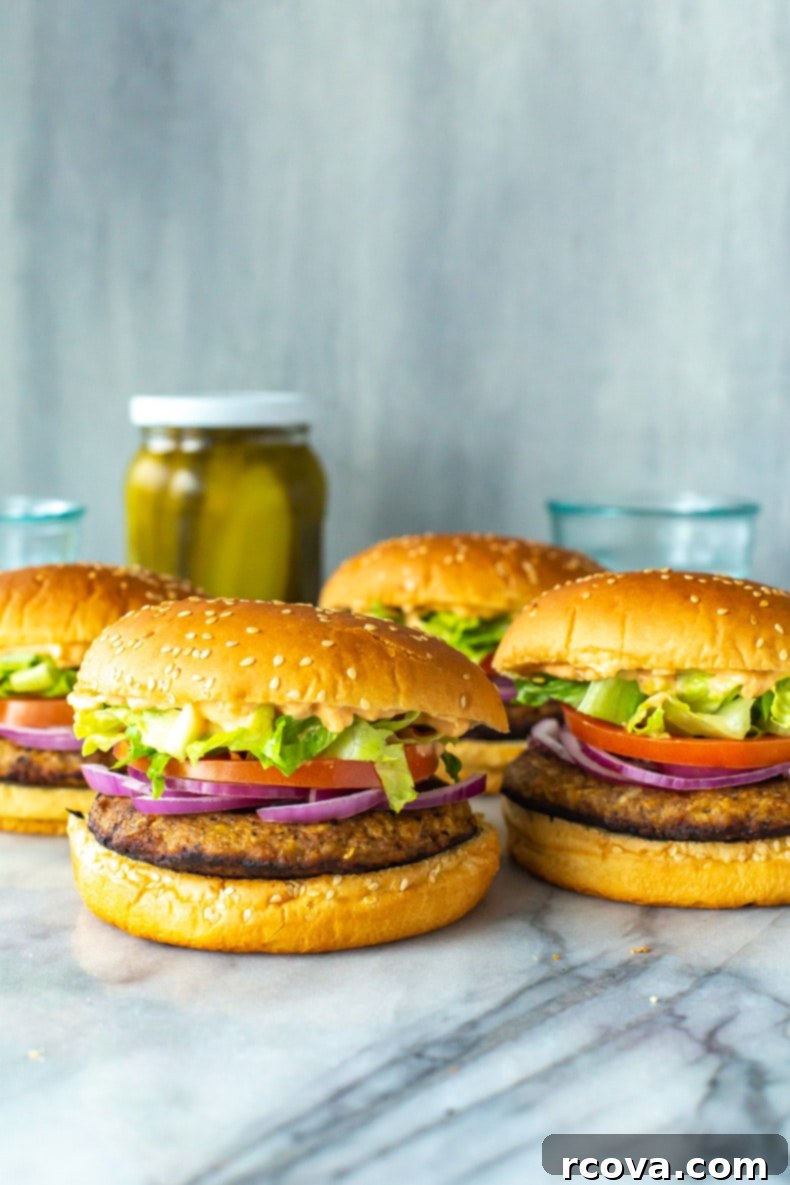 Succulent Turkey Burgers The Ultimate Recipe 2 A perfectly cooked, juicy turkey burger with cheese and fresh toppings, ready to be served on a toasted bun.