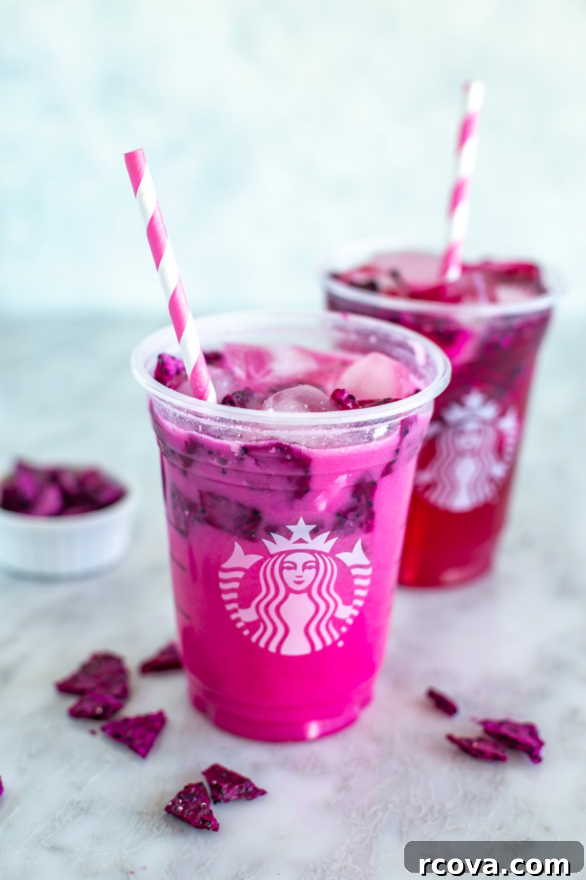 Vibrant Mango Dragonfruit Refresher 7 A copycat Starbucks dragon drink (with coconut milk) and mango dragonfruit refresher (without coconut milk) behind it.