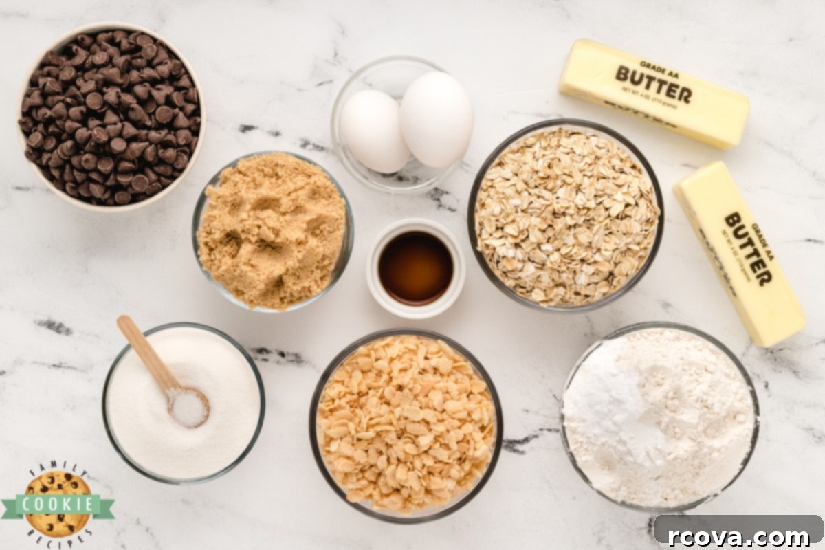 Ultimate Rice Krispie Chocolate Chip Cookies 7 Assortment of dry and wet ingredients for Rice Krispie Chocolate Chip Cookies, laid out on a wooden surface