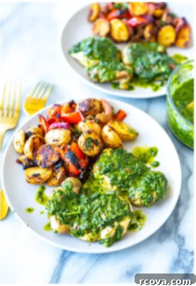 Zesty Baked Chimichurri Chicken 8 Overhead shot of plated dish with fork and sauce on each side
