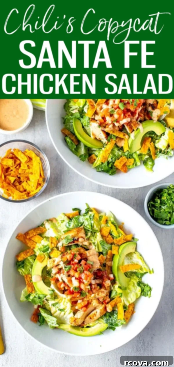 Fiery Mesa Chicken Salad 12 This Santa Fe Chicken Salad is a perfect Chili's copycat recipe loaded with spicy chicken, yummy veggies, tortilla strips and Santa Fe sauce. #chilis #santafesalad
