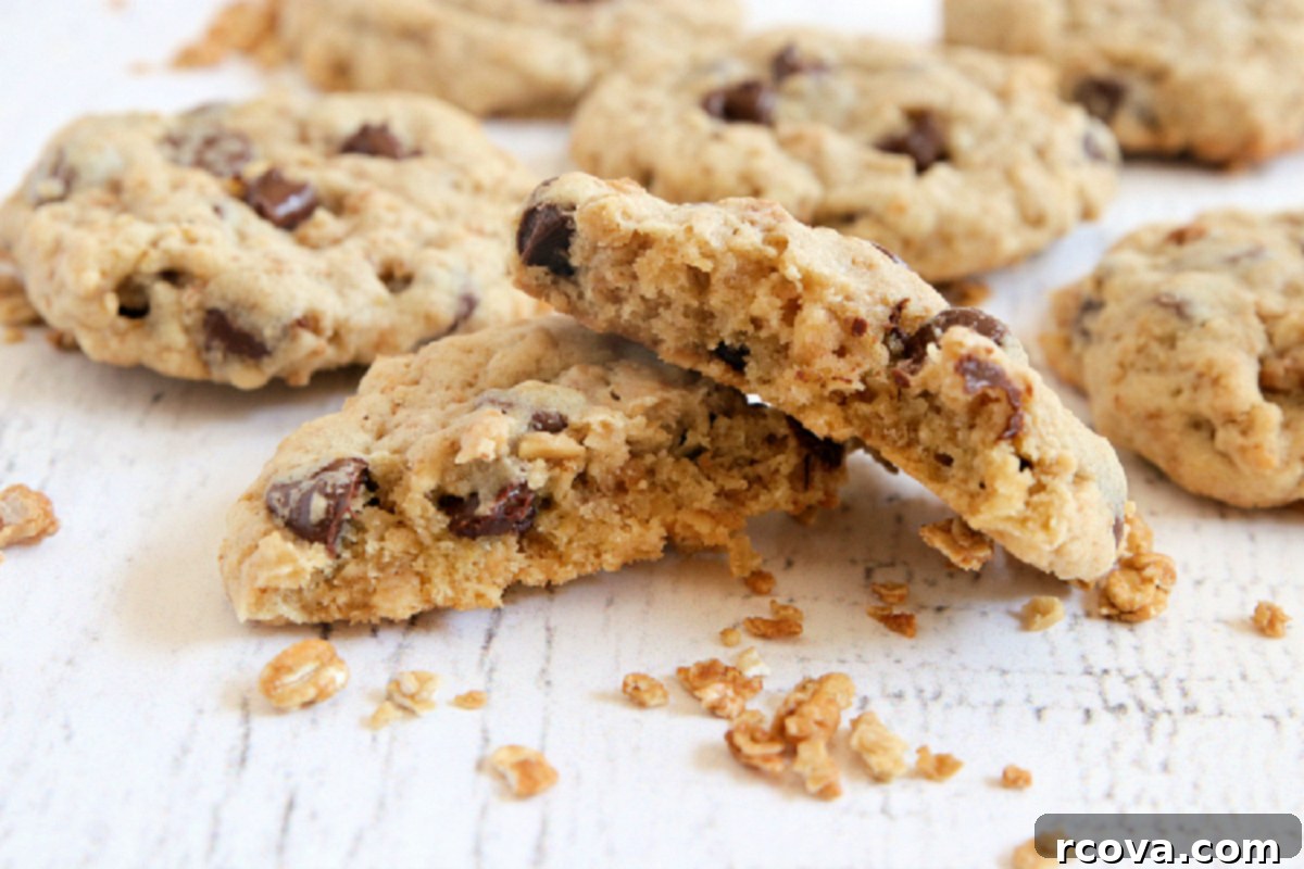 Crunchy Granola Chocolate Delights 3 Close-up of a stack of homemade chocolate chip cookies made with protein powder and granola, showing their soft, chewy texture.