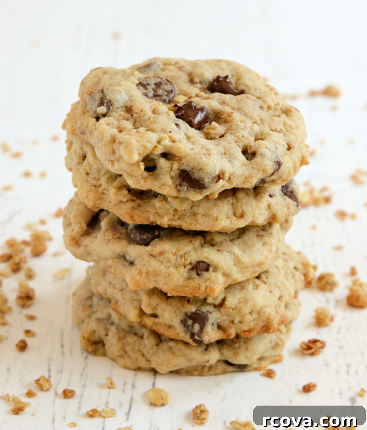 Crunchy Granola Chocolate Delights 5 A beautiful stack of freshly baked Granola Chocolate Chip Cookies, showcasing their golden edges and hearty texture.