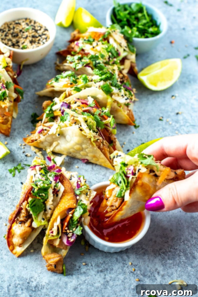 Applebee's Crispy Chicken Wonton Tacos 8 Applebee's Chicken Wonton Tacos presented beautifully on a white plate with garnishes.