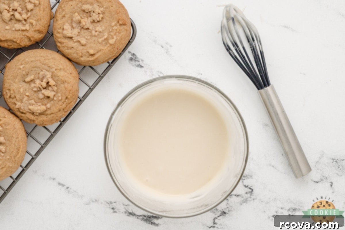 Cinnamon Streusel Cookies 12 Ingredients for a simple vanilla glaze being whisked together in a small bowl.