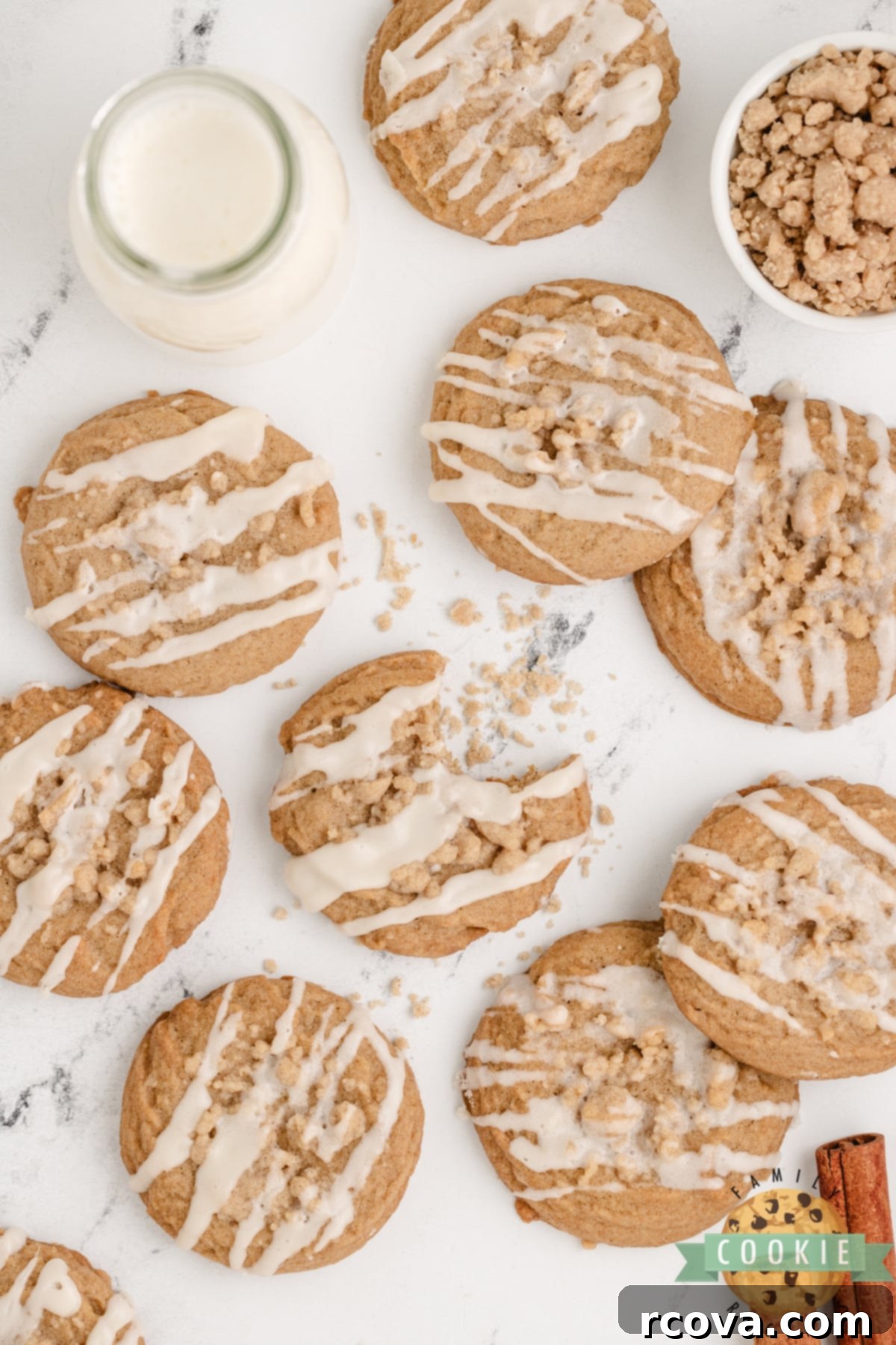 Cinnamon Streusel Cookies 13 A fresh batch of Coffee Cake Cookies cooling on a wire rack, drizzled with vanilla icing.