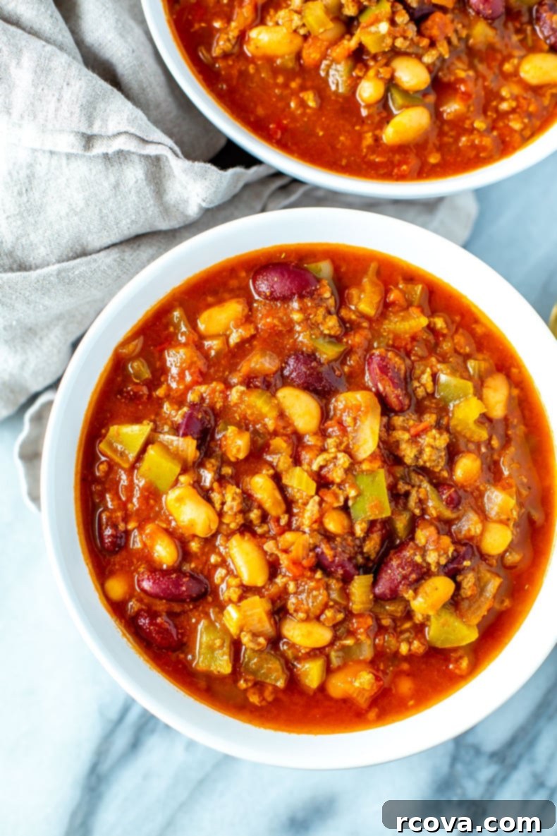 Unlock Wendy's Chili Secret 10 Another appealing shot of Wendy's Chili Copycat in a bowl, showing texture and garnishes.