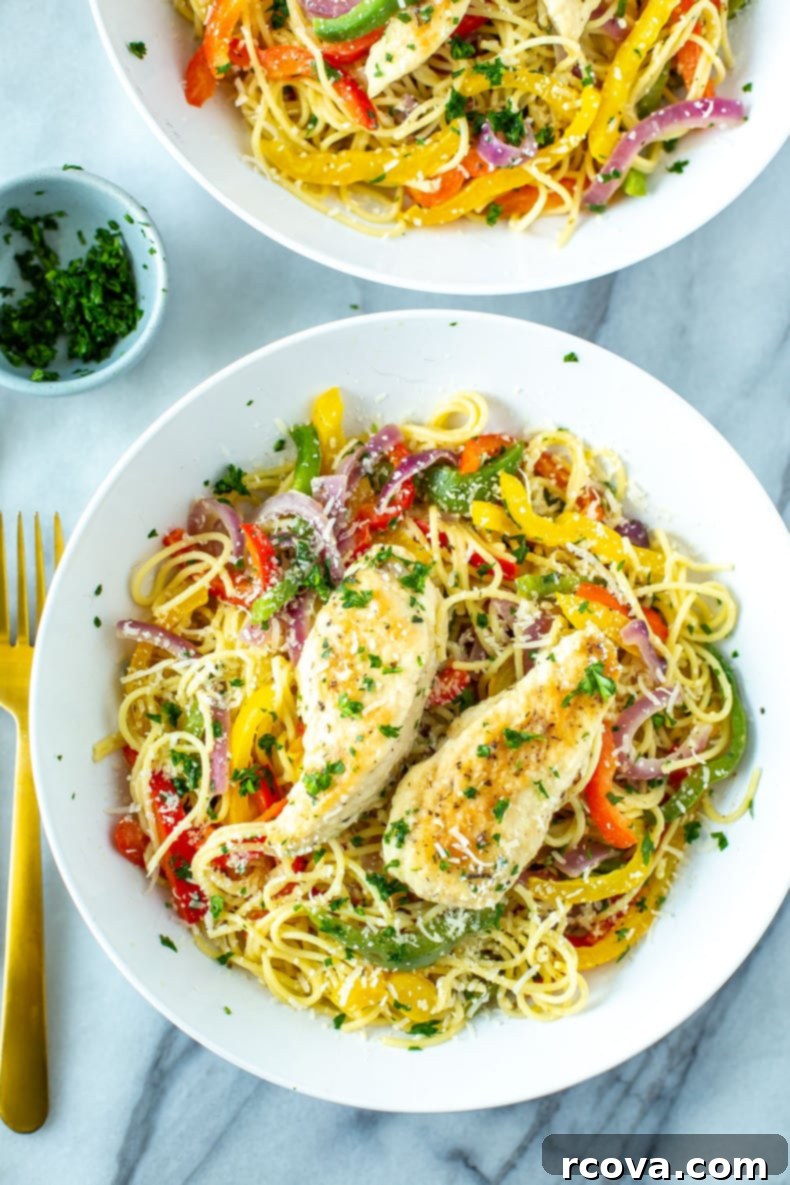 Tuscan Lemon Garlic Chicken Pasta 2 A vibrant plate of Olive Garden Chicken Scampi with breaded chicken, colorful bell peppers, and creamy pasta.