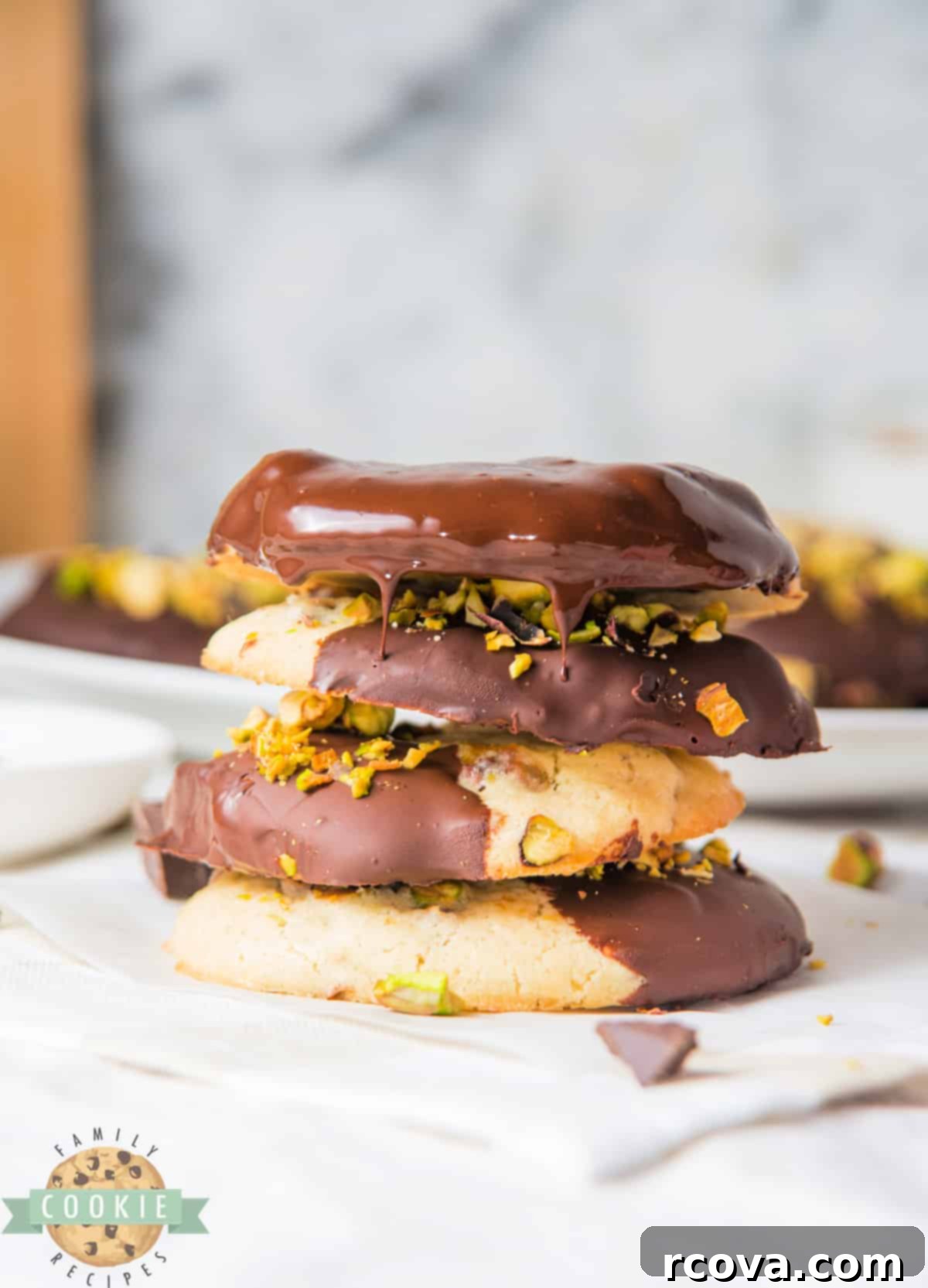 Chocolate Kissed Pistachio Delights 11 Pistachio cookies dipped in chocolate.