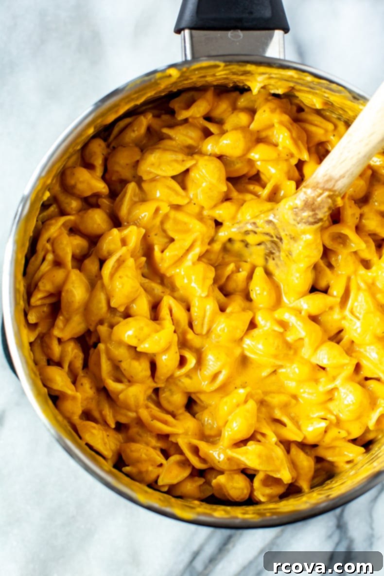Velvety Pumpkin Mac and Cheese 8 A large serving of creamy pumpkin mac and cheese in a bowl