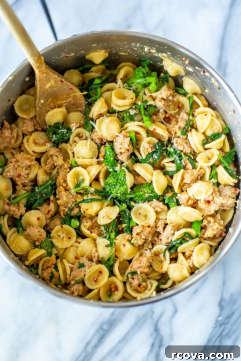 Rustic Orecchiette with Sausage and Broccoli Rabe 9 A vibrant, overhead shot of Orecchiette with Sausage and Broccoli Rabe in a rustic bowl, perfectly cooked and ready to be enjoyed.