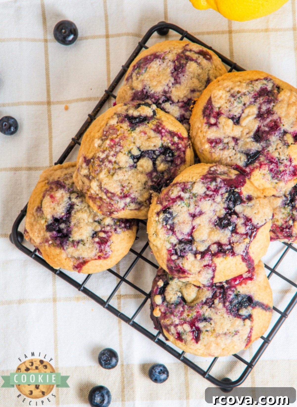 Sunshine Berry Muffin Cookies 17 A plate of freshly baked lemon blueberry muffin cookies, ready to be enjoyed.