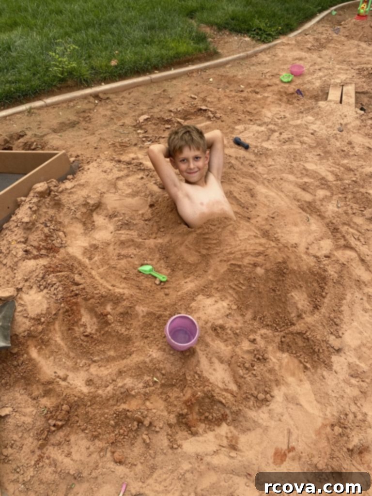 Effortless Chocolate Peanut Butter Cake Mix Cookies 11 Child buried in sand at a beach or sandbox, smiling