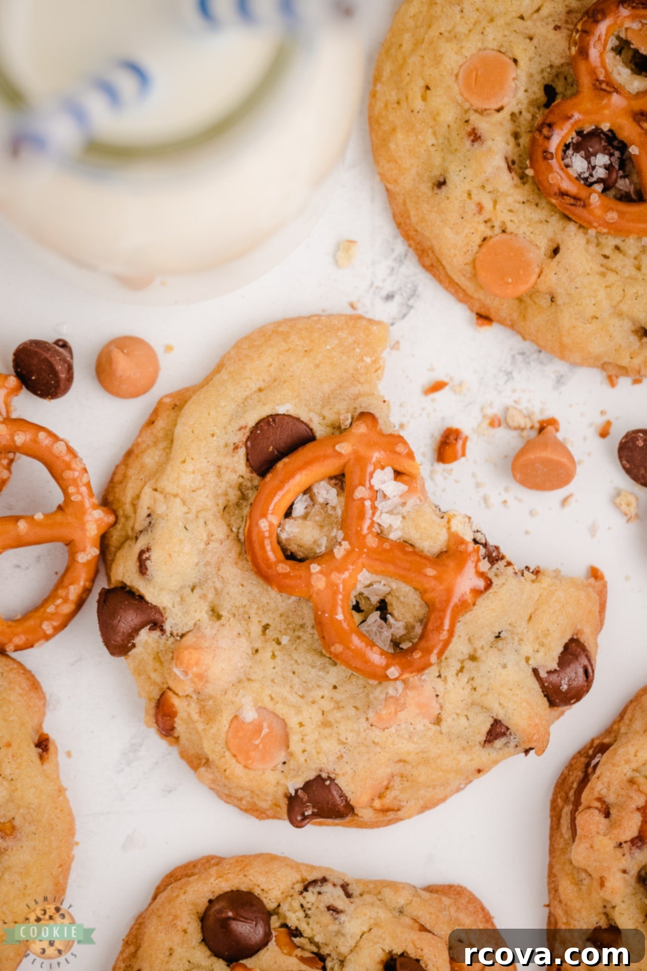 Butterscotch Pretzel Cookie Bliss 4 Close-up of a bite taken from a butterscotch pretzel cookie, showing the crunchy pretzel pieces