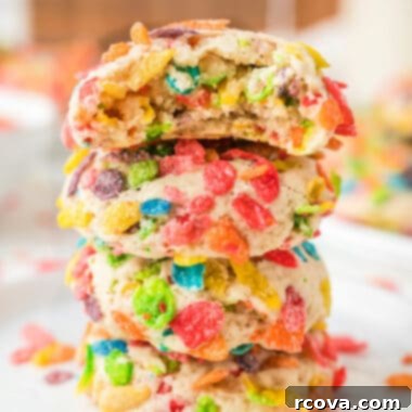 Vibrant Cereal Cookie Delights 13 A vibrant Fruity Pebbles Cookie with a soft texture and colorful cereal coating.