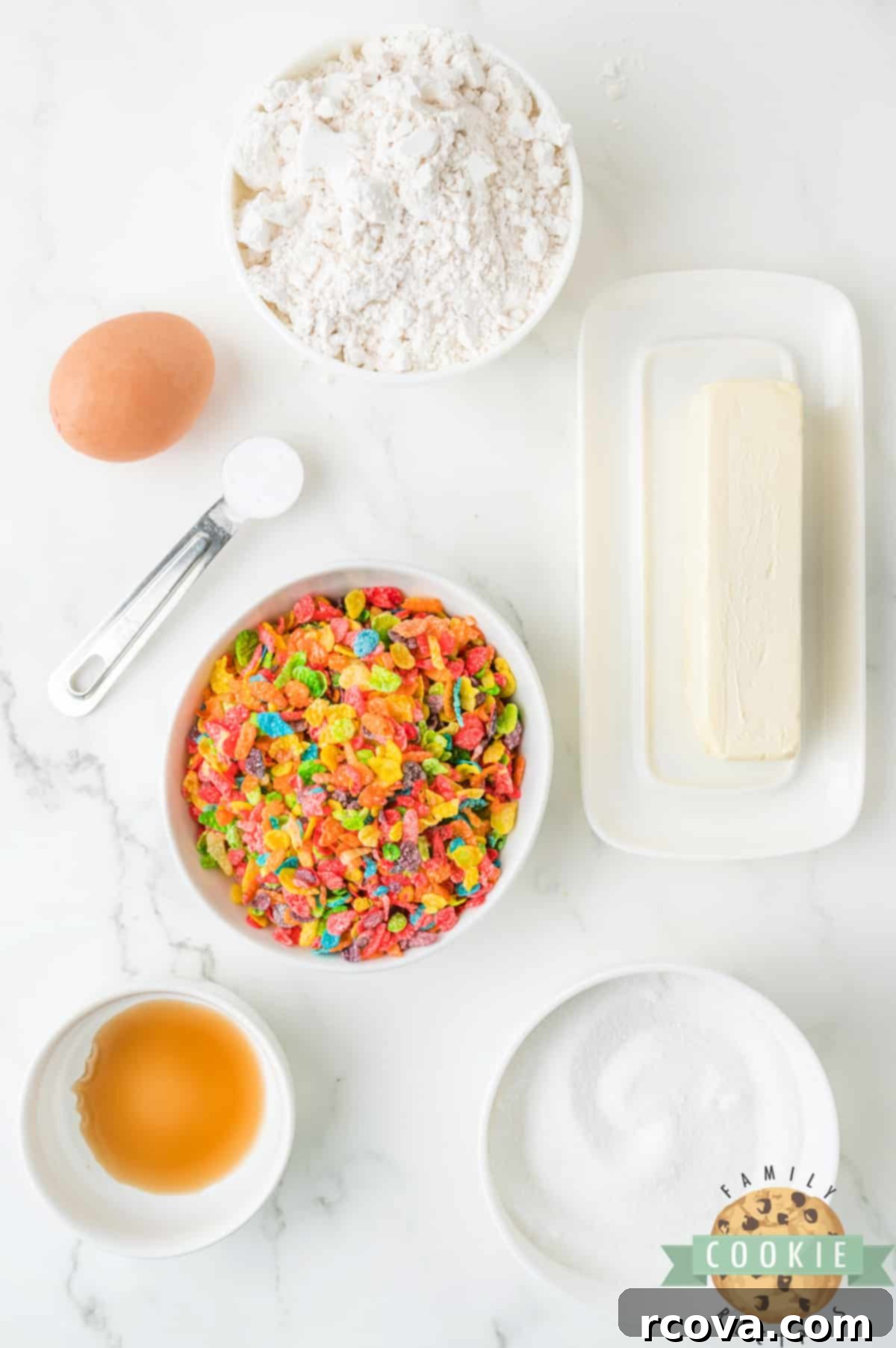 Vibrant Cereal Cookie Delights 3 A collection of essential ingredients for making delicious Fruity Pebbles Cookies.