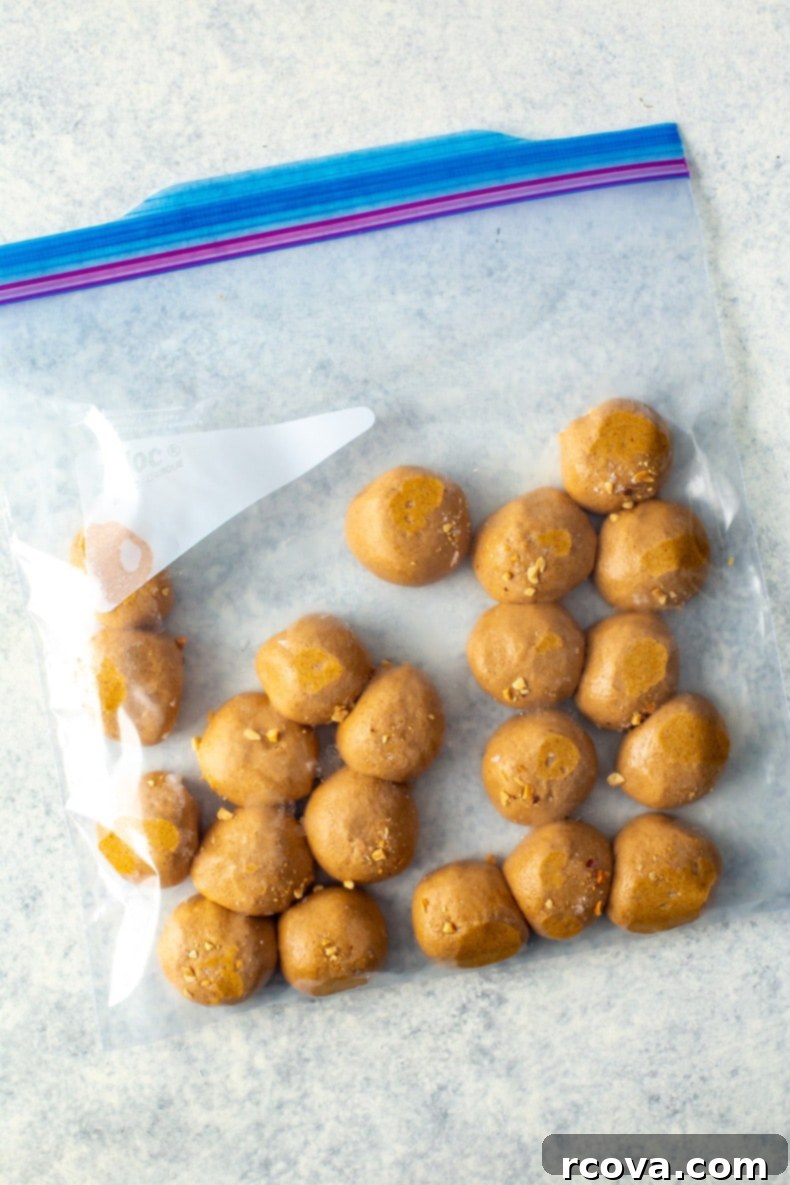 Three Ingredient Peanut Butter Protein Energy Bites 8 A selection of protein balls, including peanut butter ones, showing different flavors.