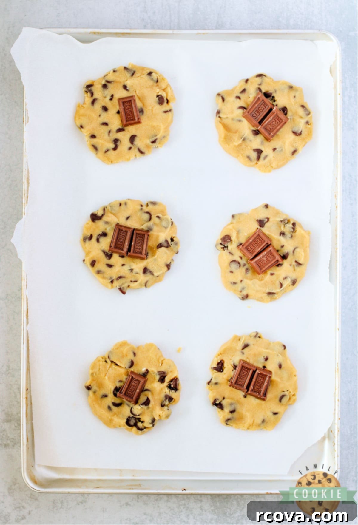 GIANT SMORES STUFFED COOKIES 9 Add Hershey bars to cookie dough.