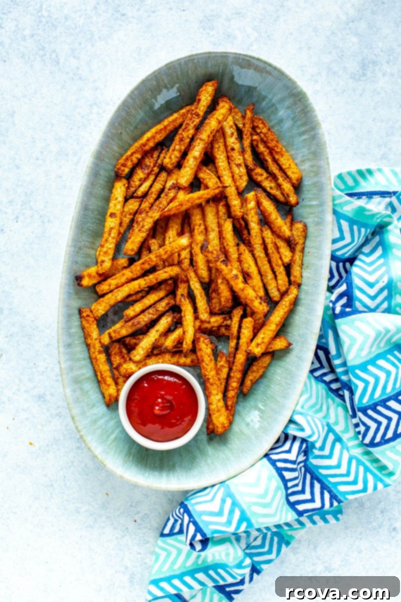Healthy Crispy Air Fryer Jicama Fries 2 Crispy Low-Carb Jicama Fries ready to serve from the air fryer basket.