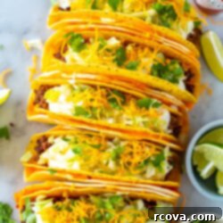 Copycat Cheesy Gordita Crunch Perfection 11 An overhead shot of five cheesy gordita crunch tacos.