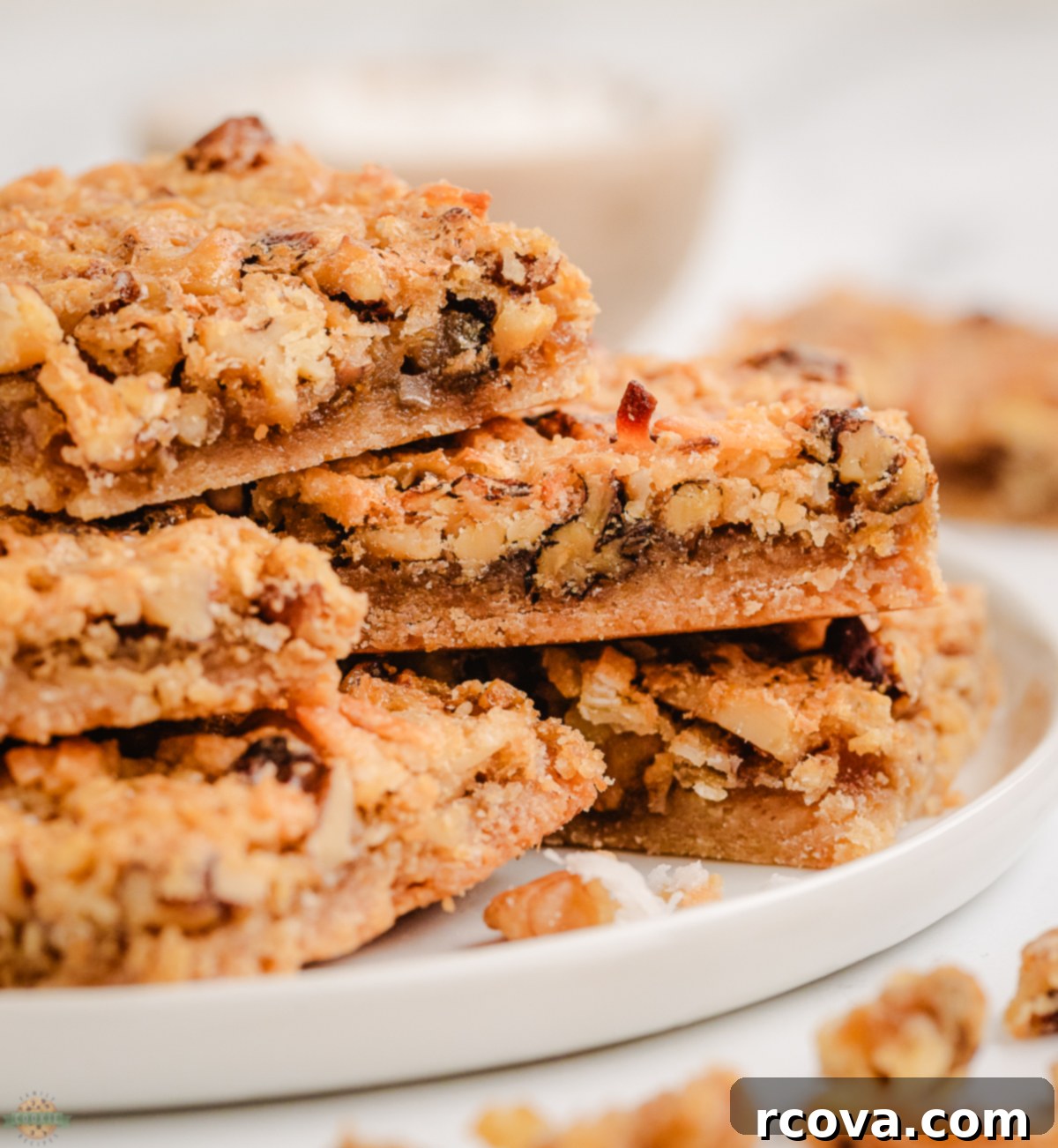 Tropical Coconut Dreams 2 stack of coconut dream bars on a white plate