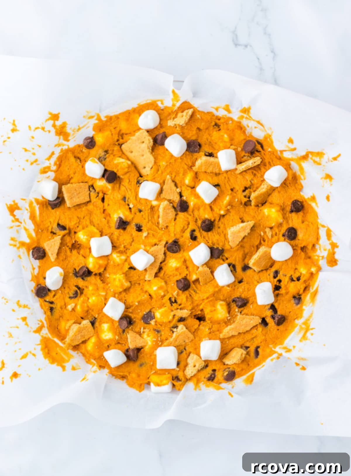 Spiced Pumpkin Smores Cookie Cake 11 Spread cookie dough into a pie pan.