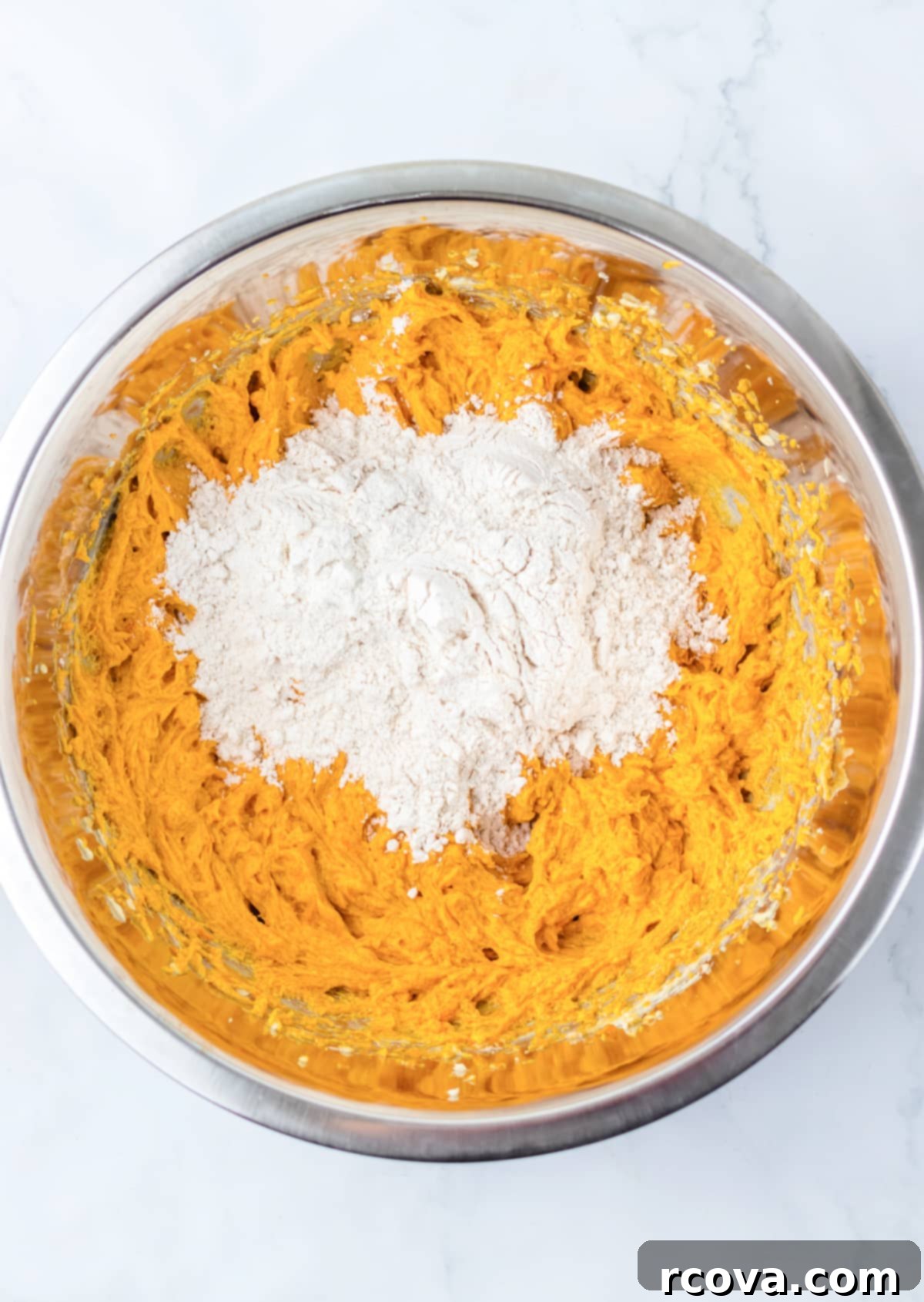 Spiced Pumpkin Smores Cookie Cake 9 Mix wet and dry ingredients together.