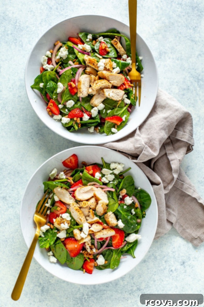 Vibrant Strawberry Spinach Chicken Salad 9 Strawberry Spinach Salad with Chicken in a white bowl, close-up, highlighting the fresh ingredients.