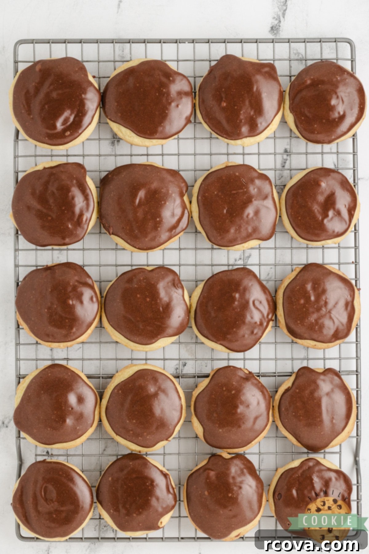 Decadent Orange Fudge Cookies 13 Rich fudge topping generously spread over cooled orange cookies.