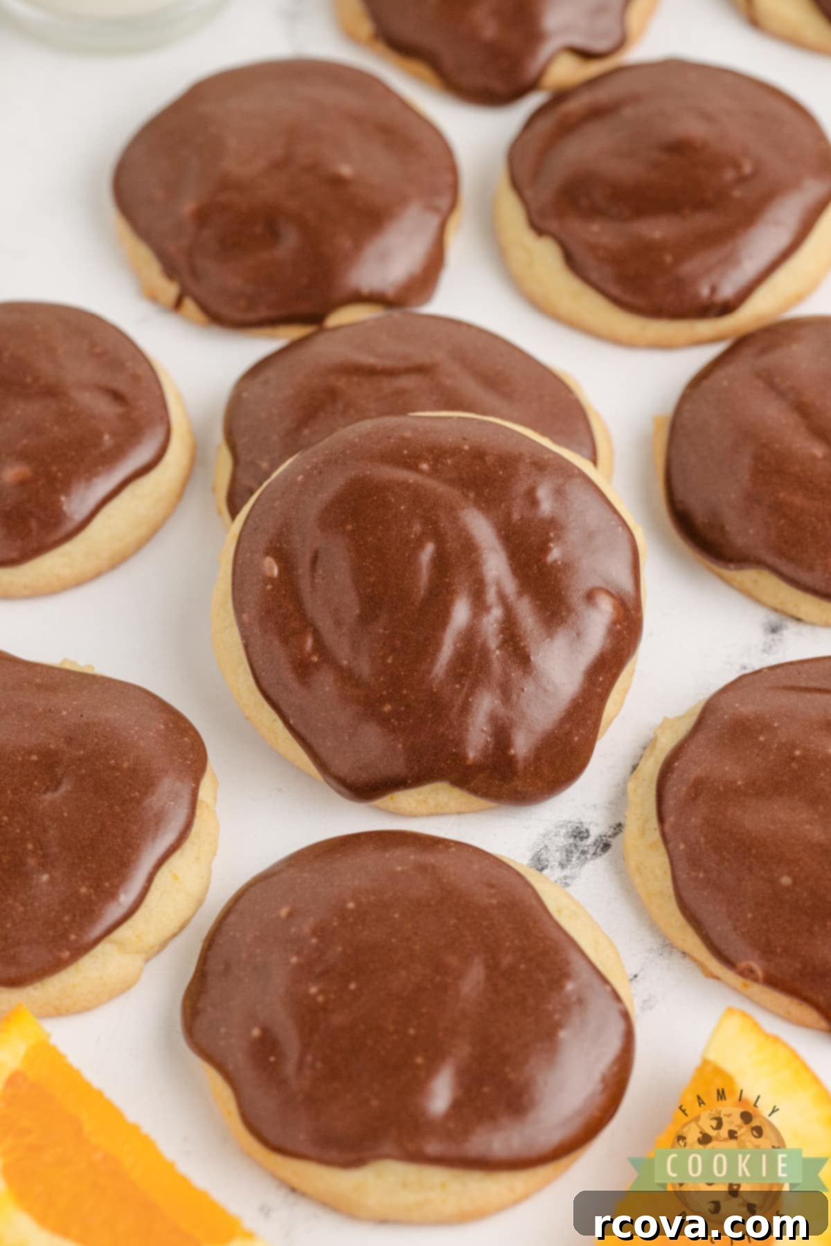 Decadent Orange Fudge Cookies 15 Thick, soft orange cookies generously topped with a rich, dark fudge, perfect for any occasion.